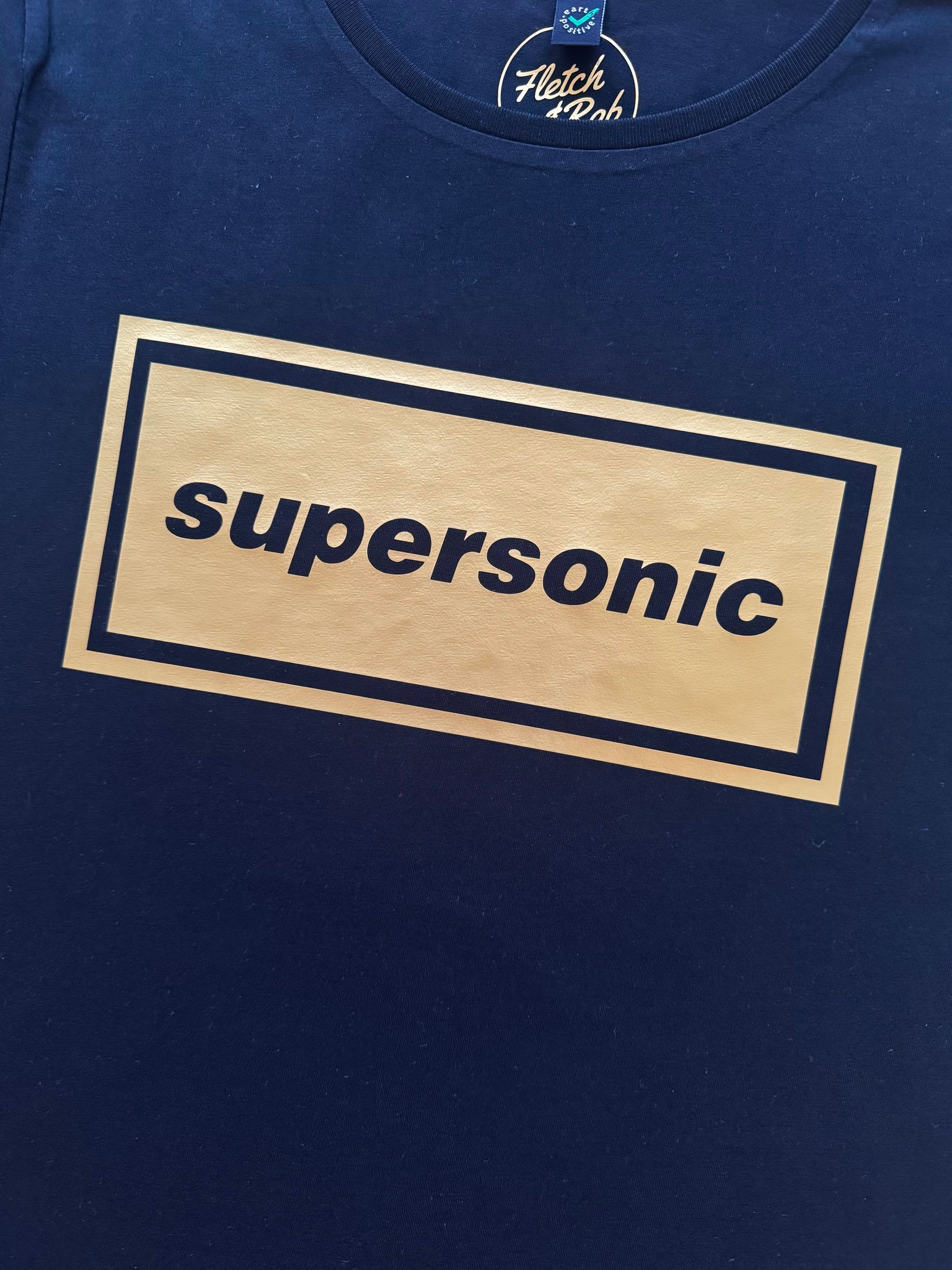 The Black and Gold Supersonic Ladies T-Shirt